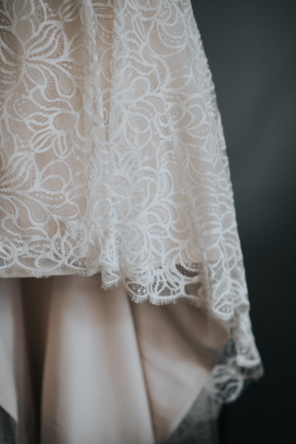 closeup of lace details of wedding dress
