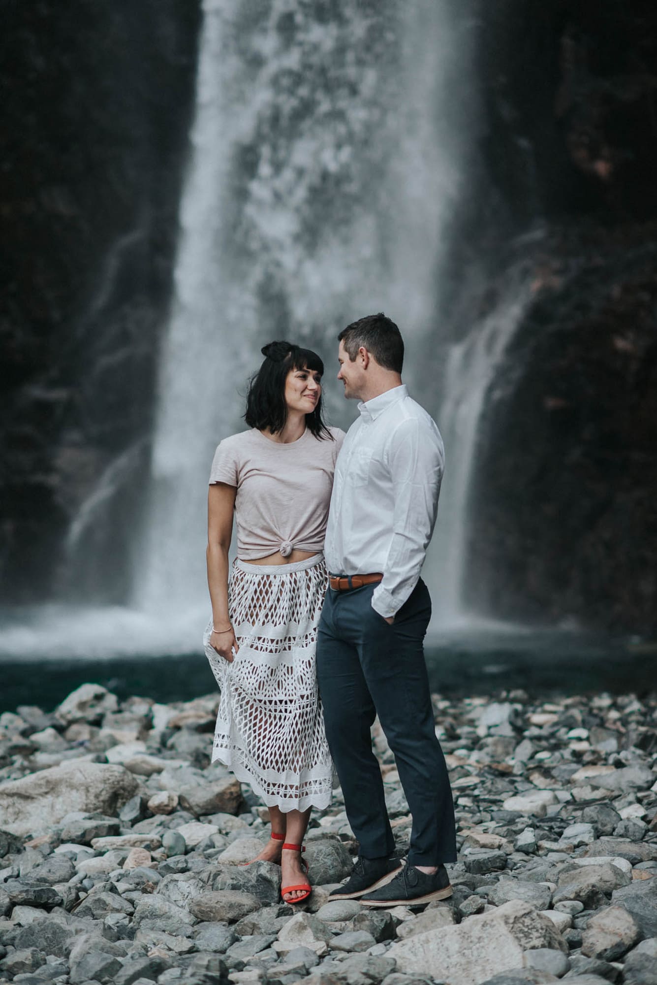 Couple smiling during their engagement photography at franklin falls