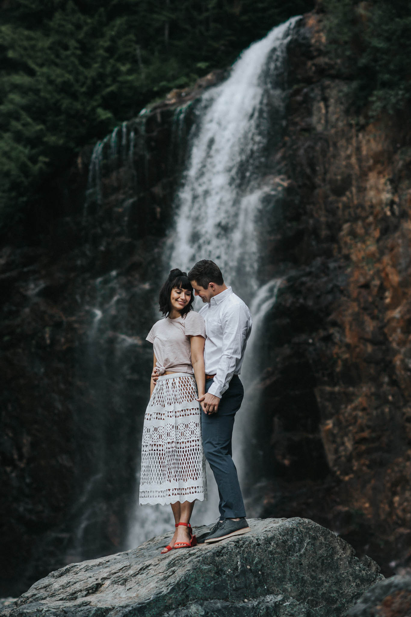 This is a photo of an adventurous couple during their Franklin Falls Engagement Session