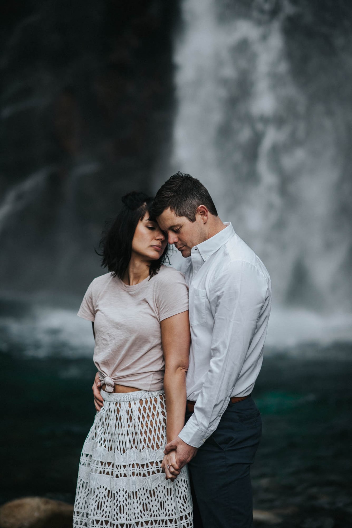 here is a photo of a sweet couple's engagement photos at franklin falls in snoqualmie pass washington