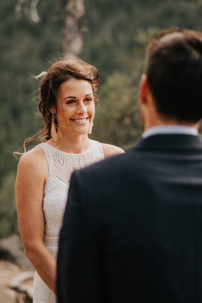bride smiling at groom during elopement ceremony