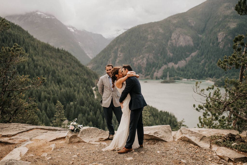 bride and groom first kiss at diablo lake