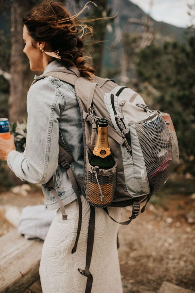 how this bride packed champagne into her backpack