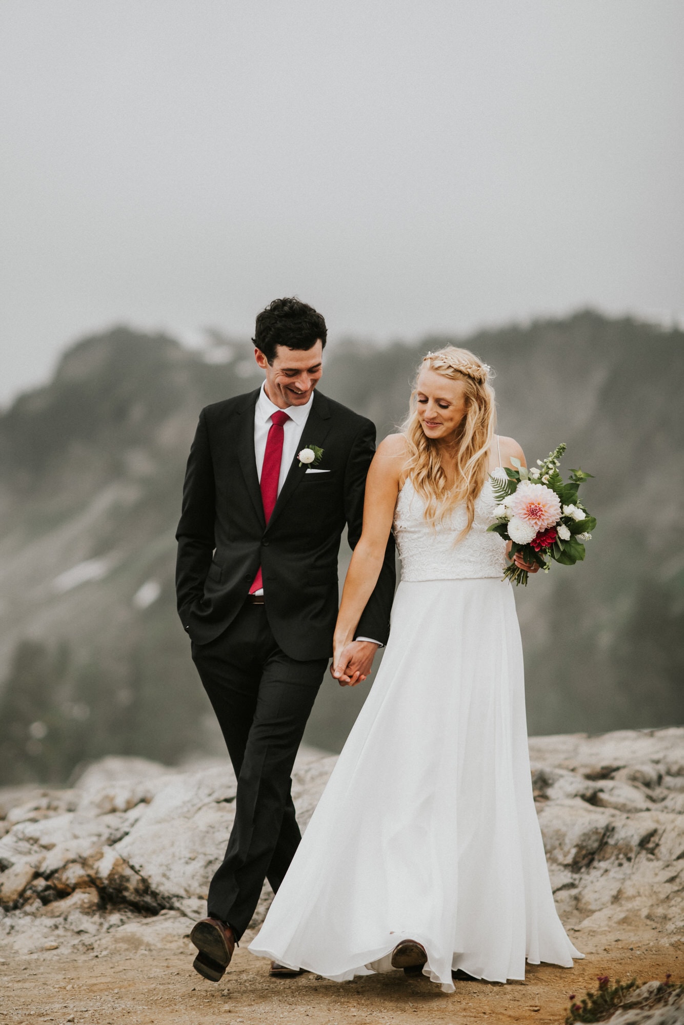 bride and groom walking together at Artist Point Washington