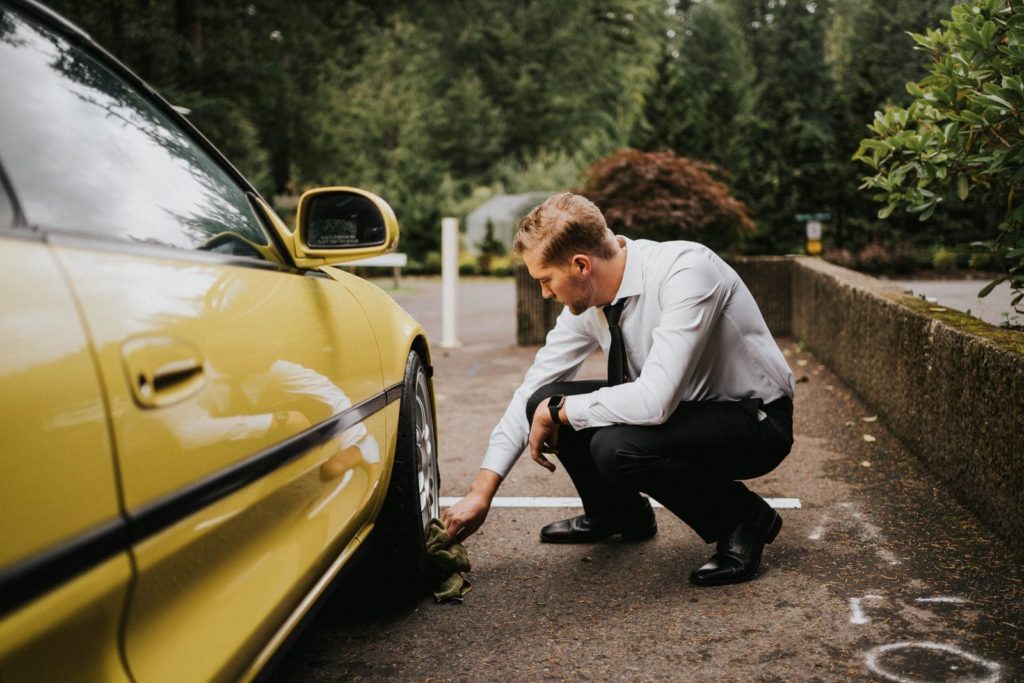 Groom working on the car