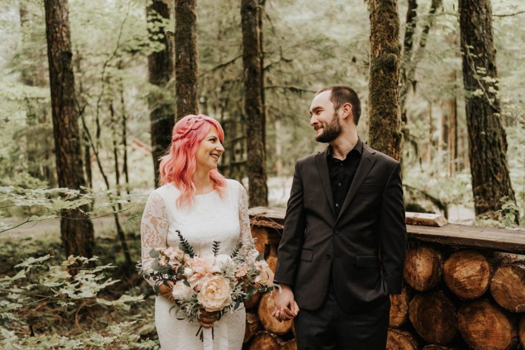 couple eloping in Washington State forest. Elopement Photographer Package in Washington